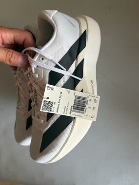 adidas Adizero Evo SL Women’s Sneakers in White and Dark Green